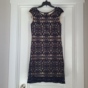 Navy and tan lace dress.